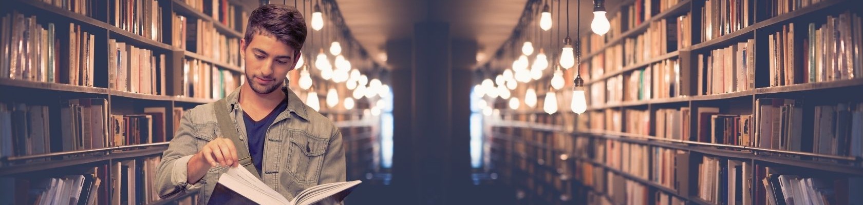 pharmacy student reading book in library